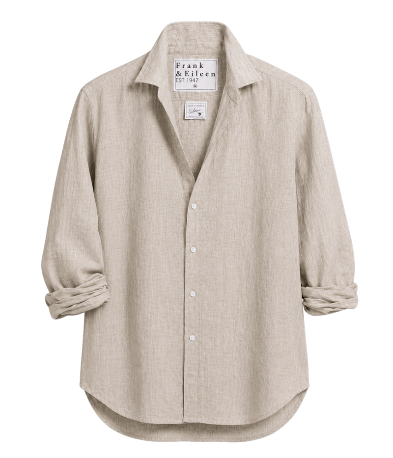 Frank + Eileen Finbar Woven Button Up Shirts In Sand laid flat, showing the spread collar, button front, curved hem and rolled sleeves