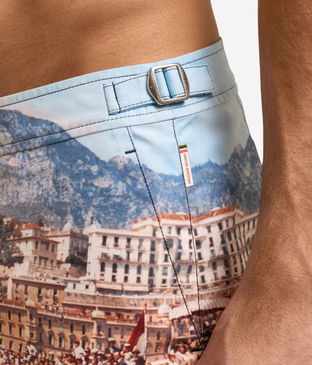 Close-up of Orlebar Brown Bulldog Photographic Mid-Length Swim Short in Start Your Engines showing the side fastener and print