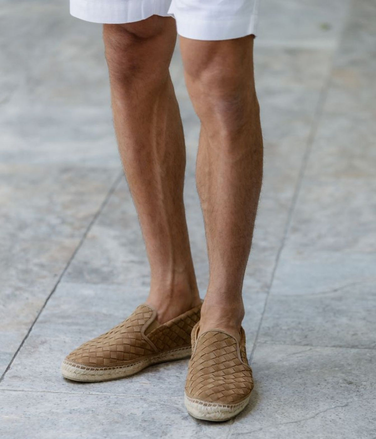 Man wearing Castañer Java Espadrilles in Arena with white shorts, front view