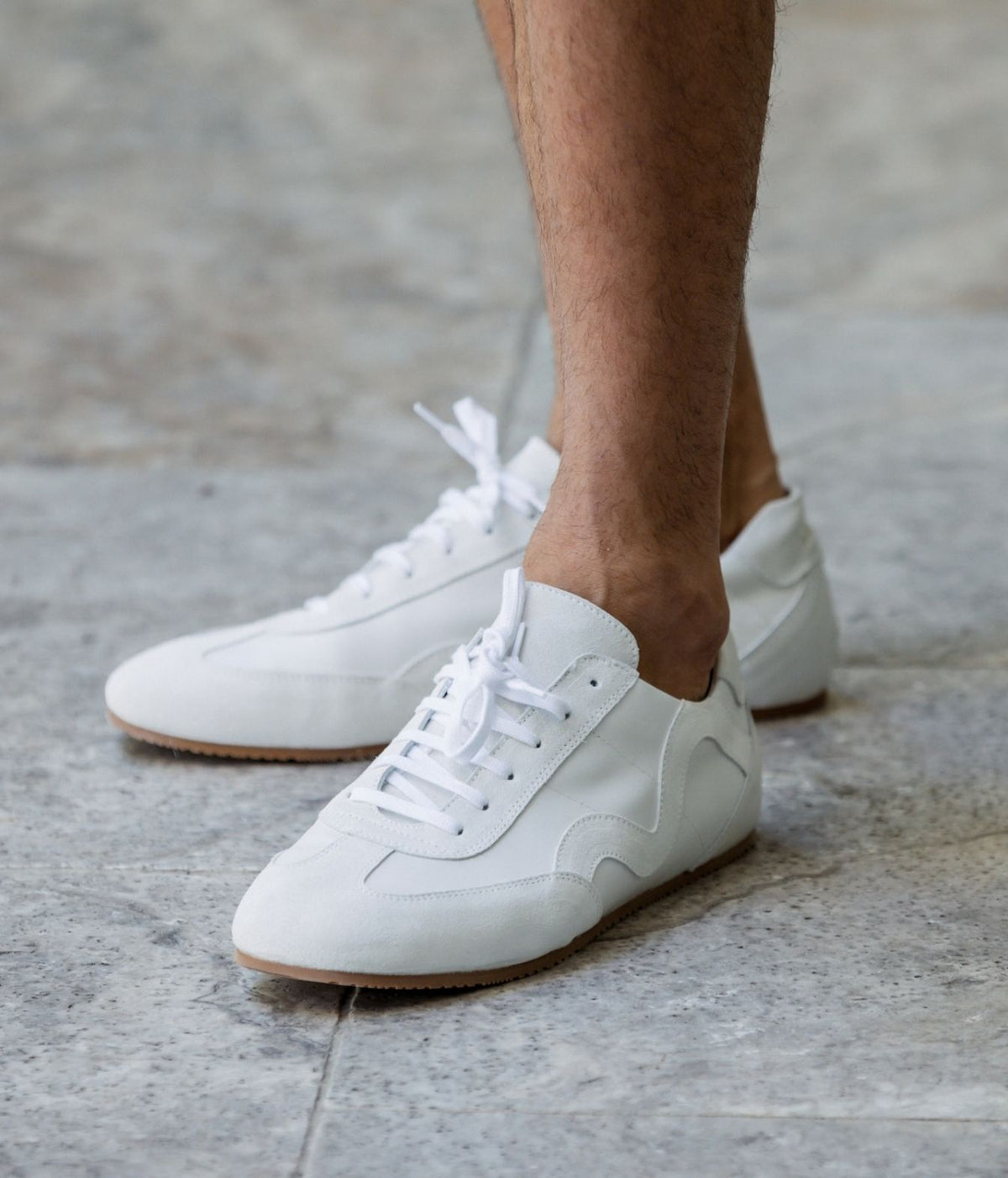 Model wearing Lardini Minimalist Wave Leather Sneaker in White