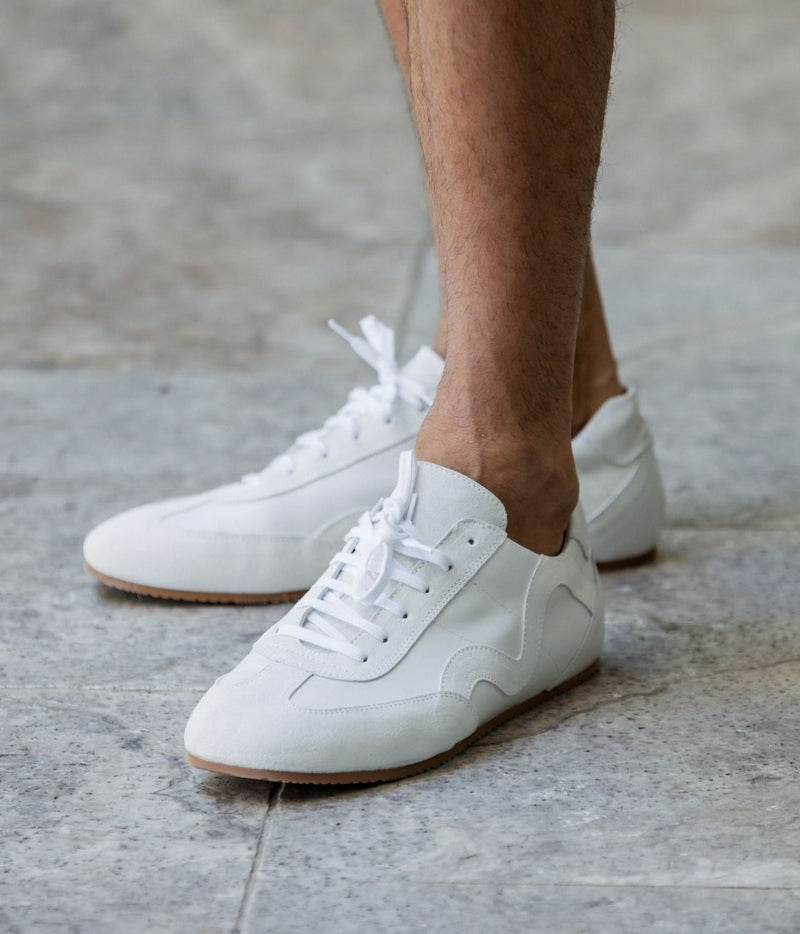 Model wearing Lardini Minimalist Wave Leather Sneaker in White