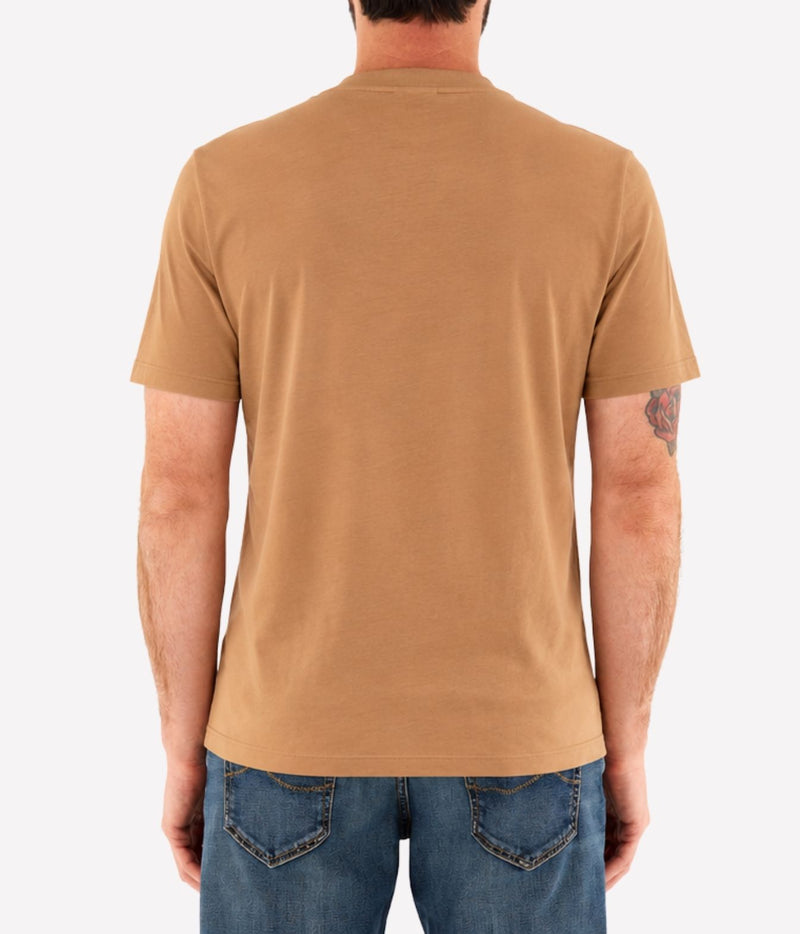 Man wearing Jacob Cohën Girocollo Costina T-Shirt in Iced Coffee Brown with blue jeans, back view