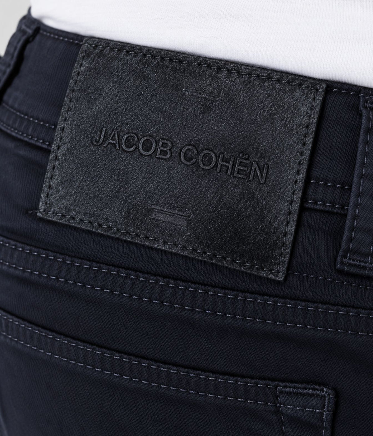Close-up of Jacob Cohën Bard Regular-Slim 5 Pocket Pants in Black showing the back logo patch and pocket