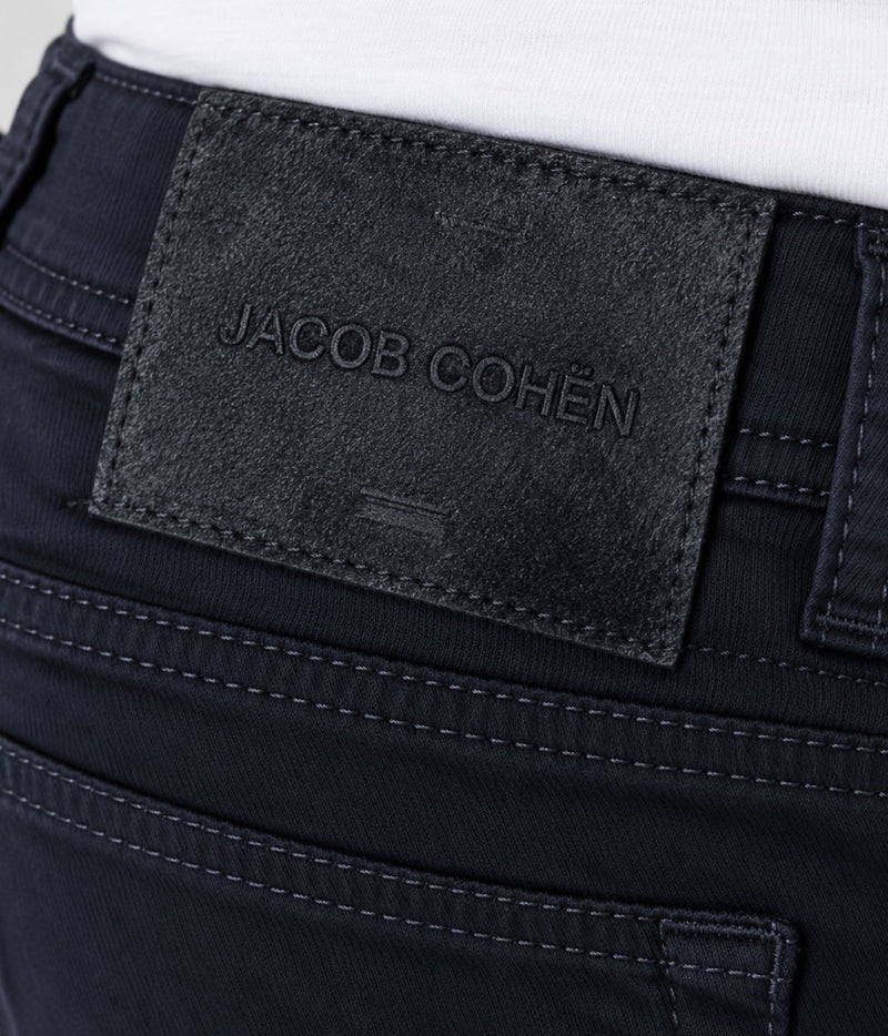 Close-up of Jacob Cohën Bard Regular-Slim 5 Pocket Pants in Black showing the back logo patch and pocket