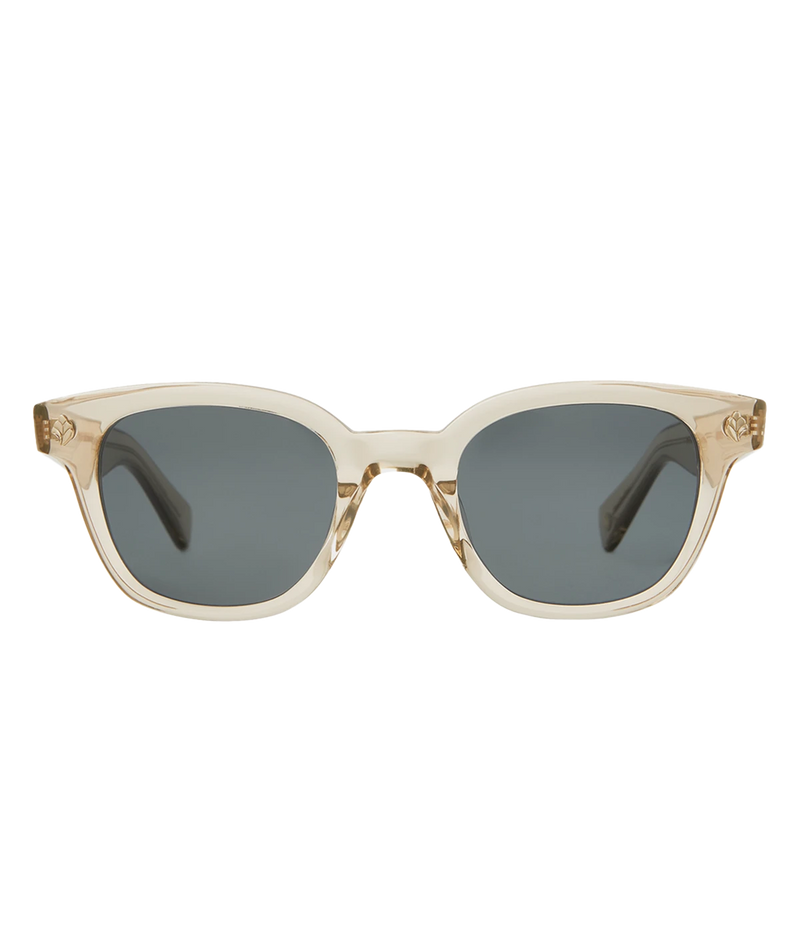 Cured cellulose acetate frame with stainless steel core wire and palm leaf plaques on exaggerated endpieces. Five barrel hinges with real rivets for a durable, stylish fit. Bold, vintage-inspired design.