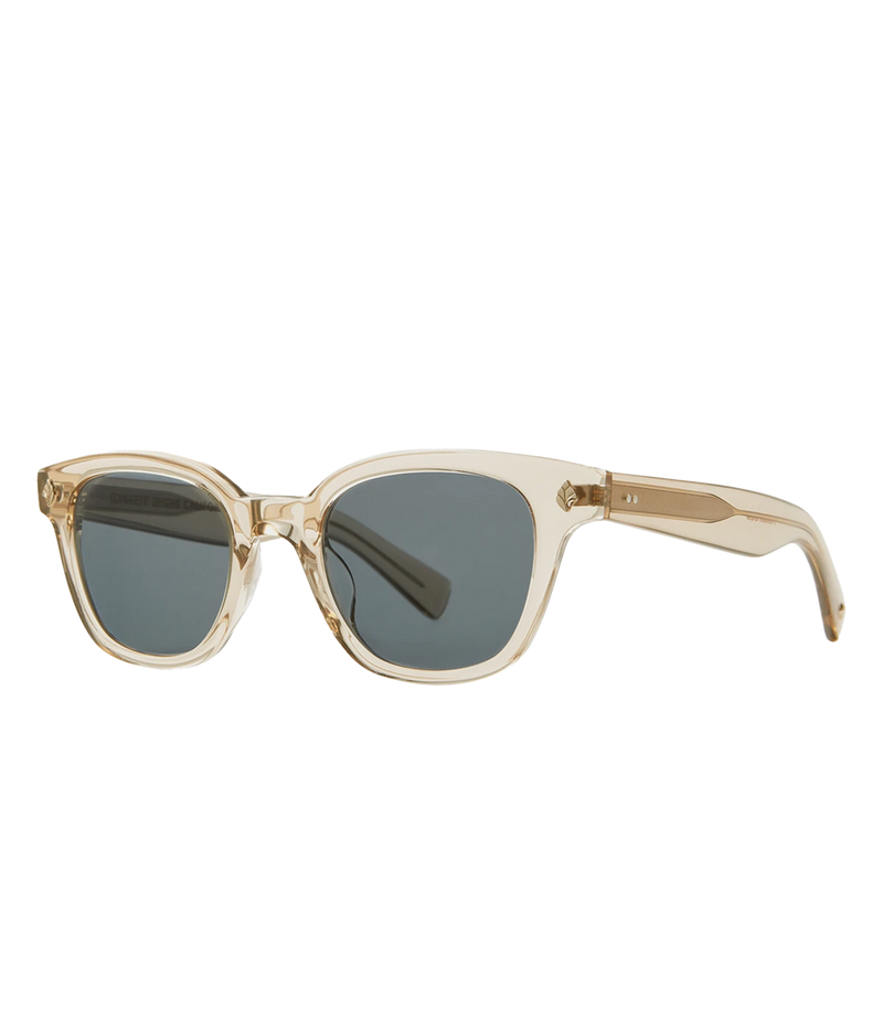 Cured cellulose acetate frame with stainless steel core wire and palm leaf plaques on exaggerated endpieces. Five barrel hinges with real rivets for a durable, stylish fit. Bold, vintage-inspired design.