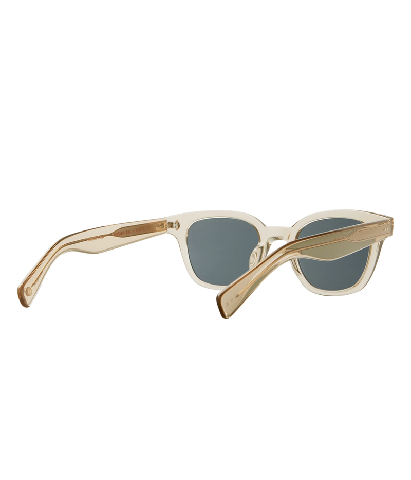 Cured cellulose acetate frame with stainless steel core wire and palm leaf plaques on exaggerated endpieces. Five barrel hinges with real rivets for a durable, stylish fit. Bold, vintage-inspired design.