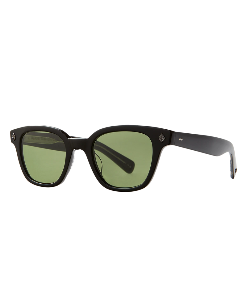 Cured cellulose acetate frame with stainless steel core wire and palm leaf plaques on exaggerated endpieces. Five barrel hinges with real rivets for a durable, stylish fit. Bold, vintage-inspired design.