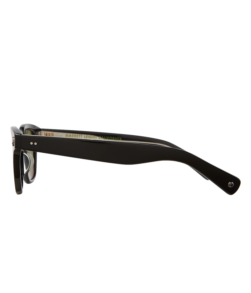 Cured cellulose acetate frame with stainless steel core wire and palm leaf plaques on exaggerated endpieces. Five barrel hinges with real rivets for a durable, stylish fit. Bold, vintage-inspired design.