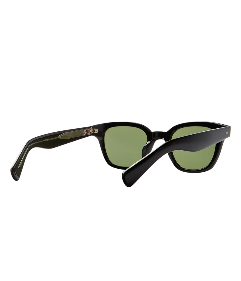 Cured cellulose acetate frame with stainless steel core wire and palm leaf plaques on exaggerated endpieces. Five barrel hinges with real rivets for a durable, stylish fit. Bold, vintage-inspired design.
