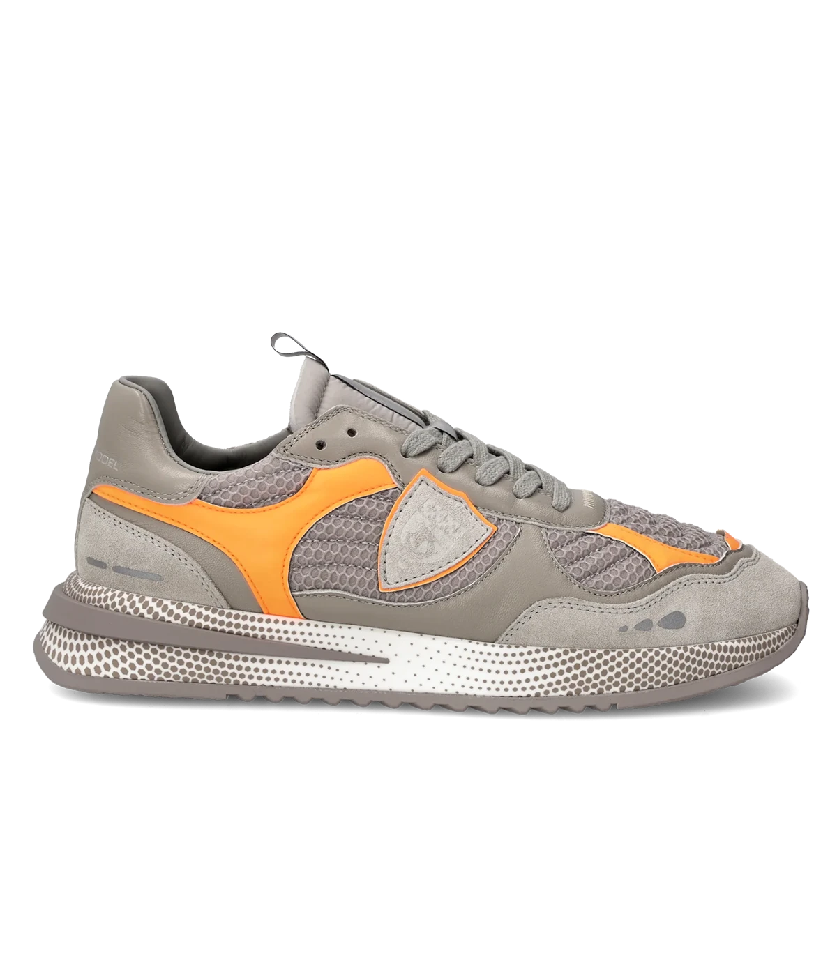A sleek and modern city sneaker, the Olympique blends sporty style with luxury. Featuring an embroidered mesh upper with a padded effect, orange accents, and a lightweight 3D sole for all-day comfort.