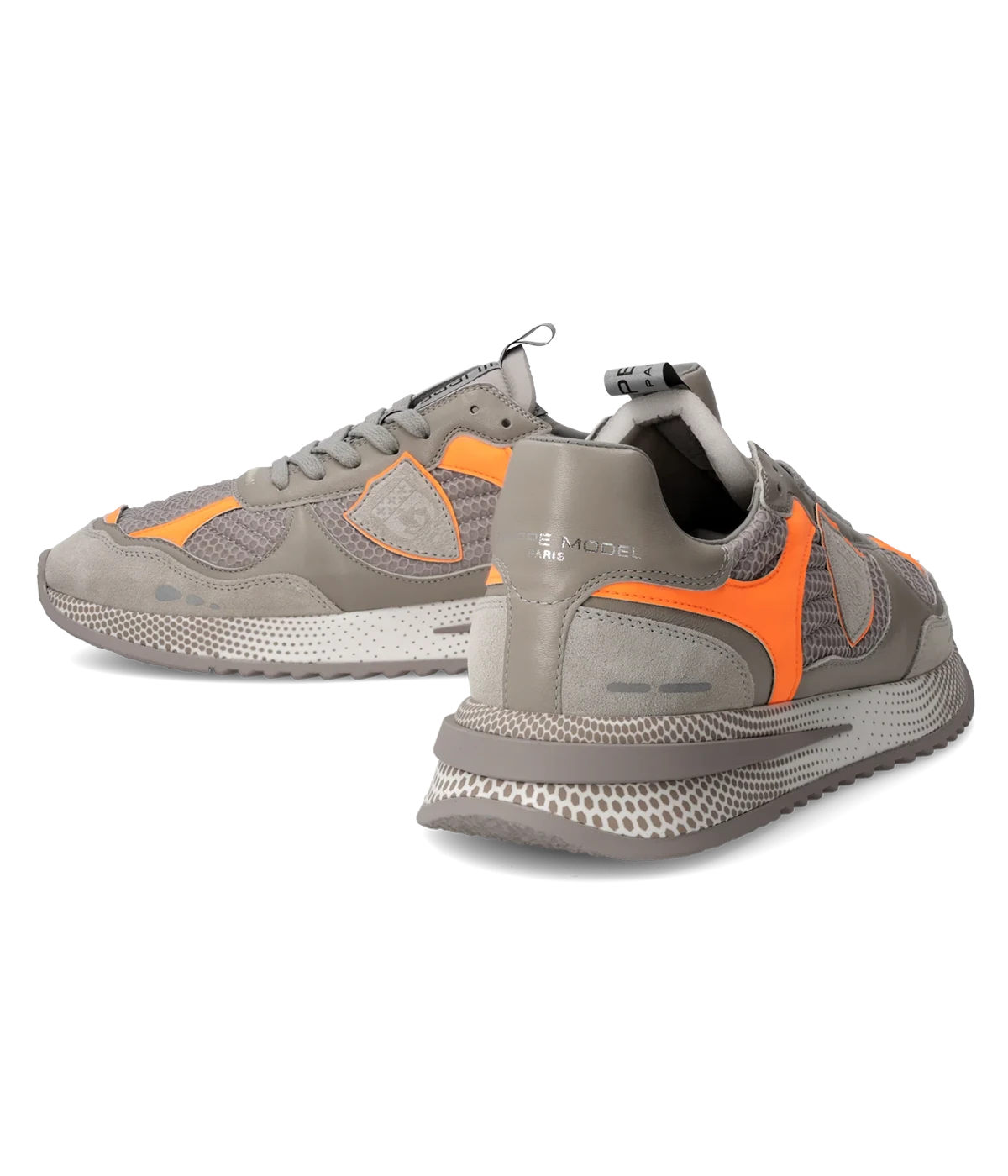 A sleek and modern city sneaker, the Olympique blends sporty style with luxury. Featuring an embroidered mesh upper with a padded effect, orange accents, and a lightweight 3D sole for all-day comfort.
