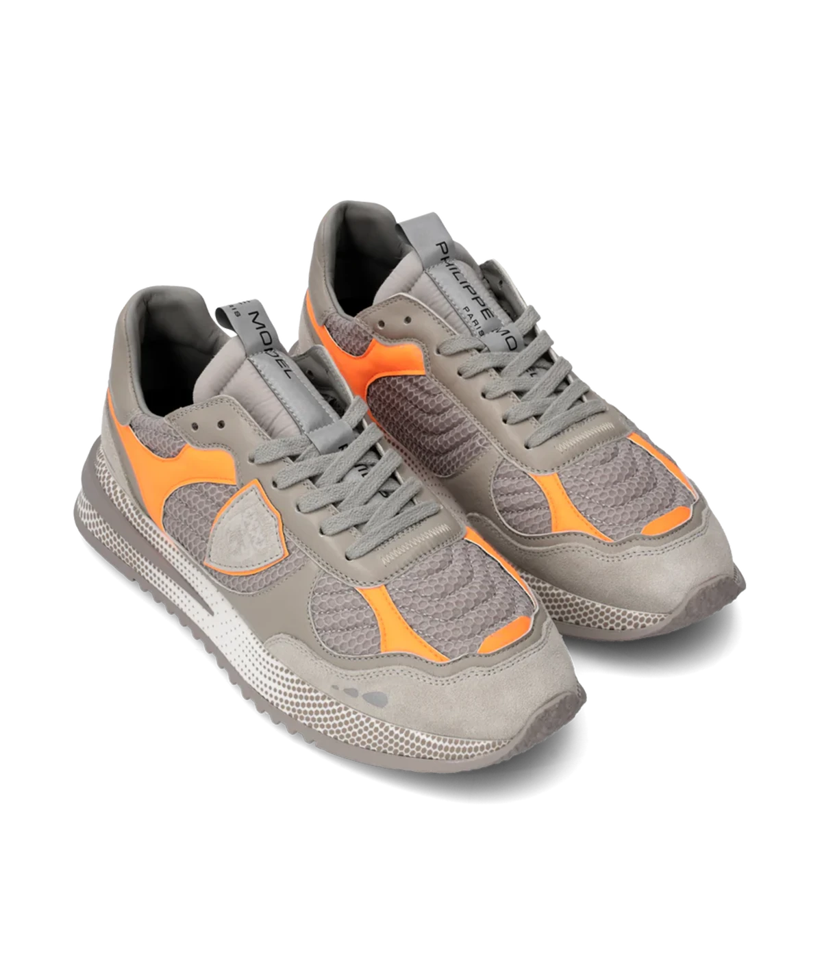 A sleek and modern city sneaker, the Olympique blends sporty style with luxury. Featuring an embroidered mesh upper with a padded effect, orange accents, and a lightweight 3D sole for all-day comfort.