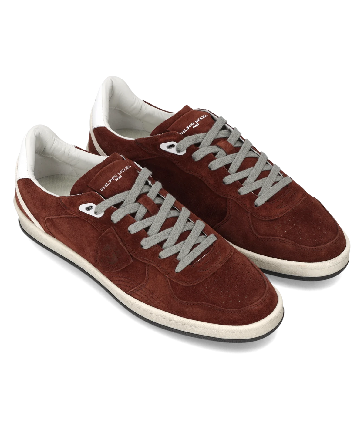 Philippe Model Pgal Low Man in Daim Bordeaux shown as a pair from a front three-quarter angle, highlighting the low-top silhouette and grey laces