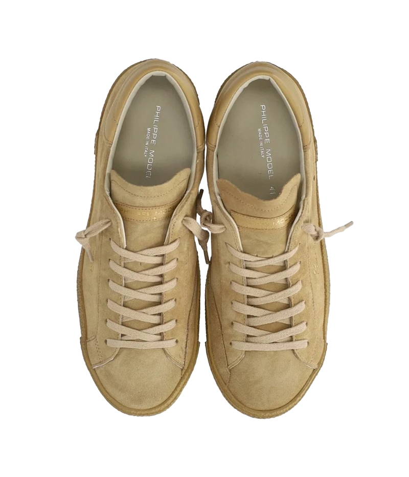 The Philippe Model PRSX Low Daim 70 sneaker combines premium leather and suede in tonal beige for a refined, casual look. Features laminated accents, a subtle "Prsx'78" print, cotton laces, and a comfortable rubber sole.