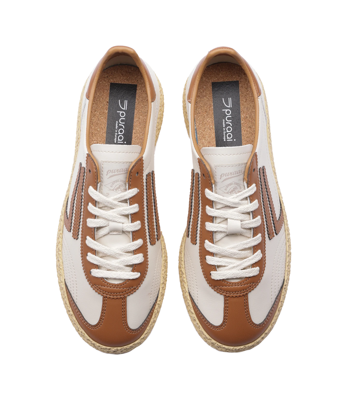 A pair of low-top sneakers shown from a top-down view. The shoes feature white panels, tan overlays, white laces, and natural jute-wrapped soles.