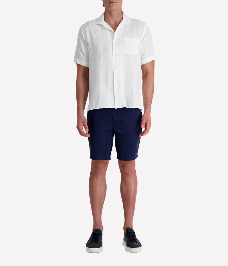 Men’s short-sleeve textured white cotton shirt with camp collar and chest pocket, designed in a regular fit for breathable, casual summer style.