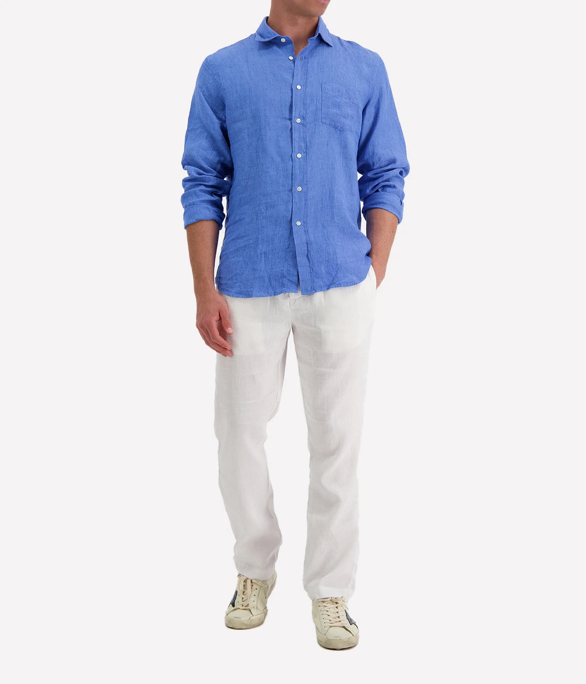 Model wearing the Paul Woven Shirt by Hartford, showcasing its regular fit, classic chest pocket, and exposed buttoning. This timeless design transitions effortlessly between casual and smart-casual outfits.