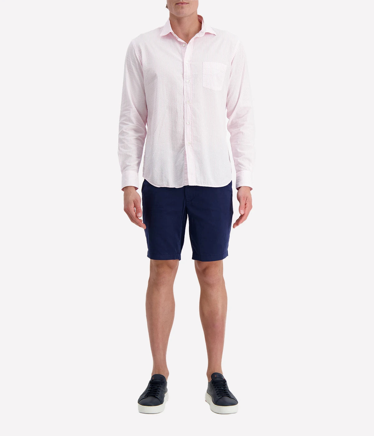 Men’s pink and white striped seersucker shirt with a regular fit, chest pocket, and slightly open collar for a breezy, polished look.