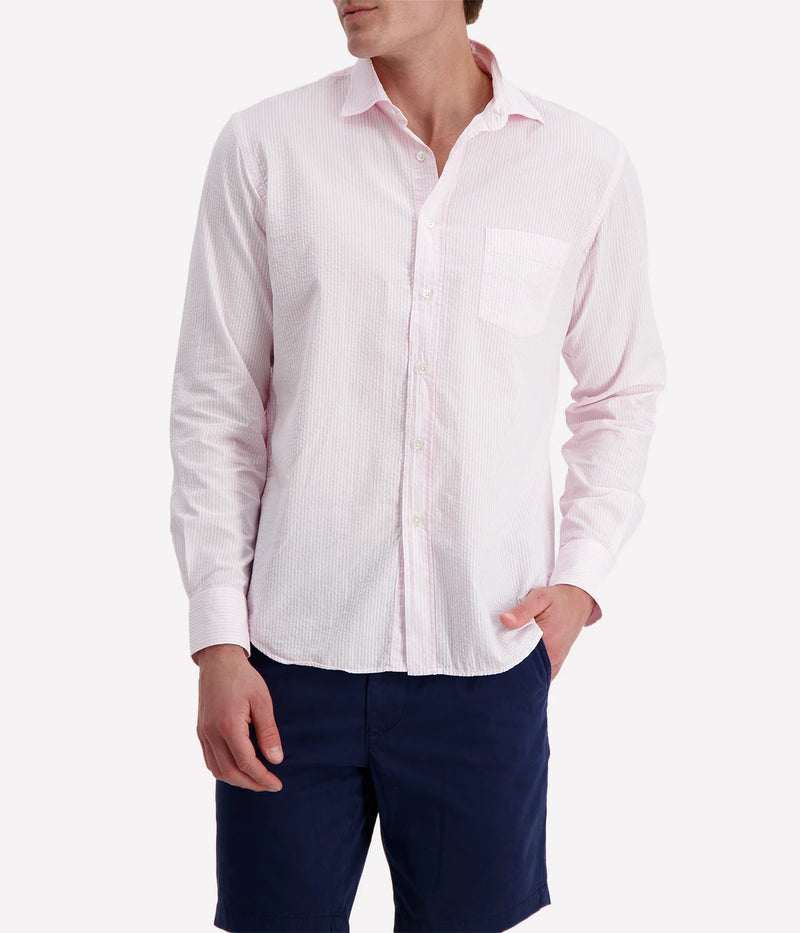 Men’s pink and white striped seersucker shirt with a regular fit, chest pocket, and slightly open collar for a breezy, polished look.