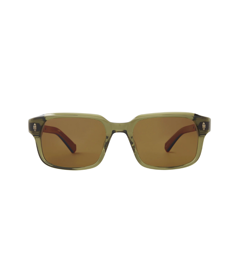 Close-up of Purveyor S sunglasses, featuring a bold, wide rectangular frame with sculpted, beveled design and custom titanium detailing.