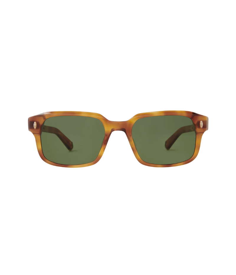 Close-up of Purveyor S sunglasses, featuring a bold, wide rectangular frame with sculpted, beveled design and custom titanium detailing.