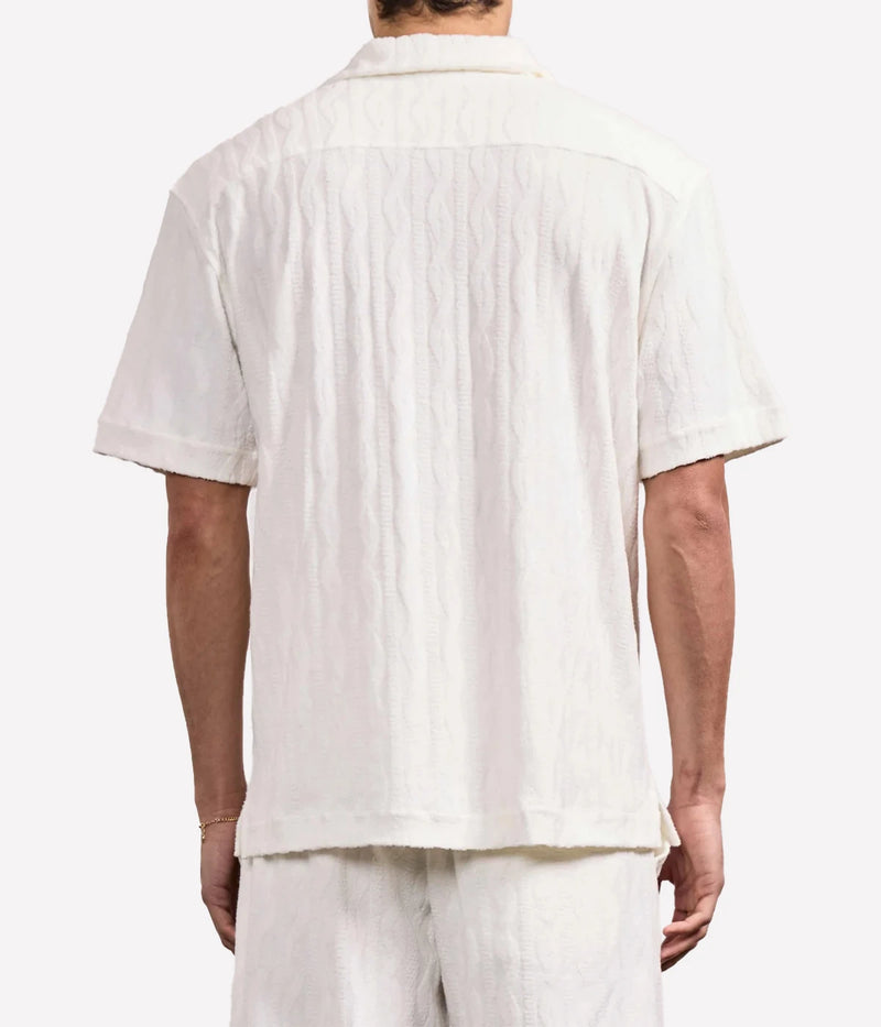 Men’s terry jacquard short-sleeve shirt in lightweight cotton-blend with cable-knit texture, camp collar, and relaxed fit, designed for warm-weather loungewear.