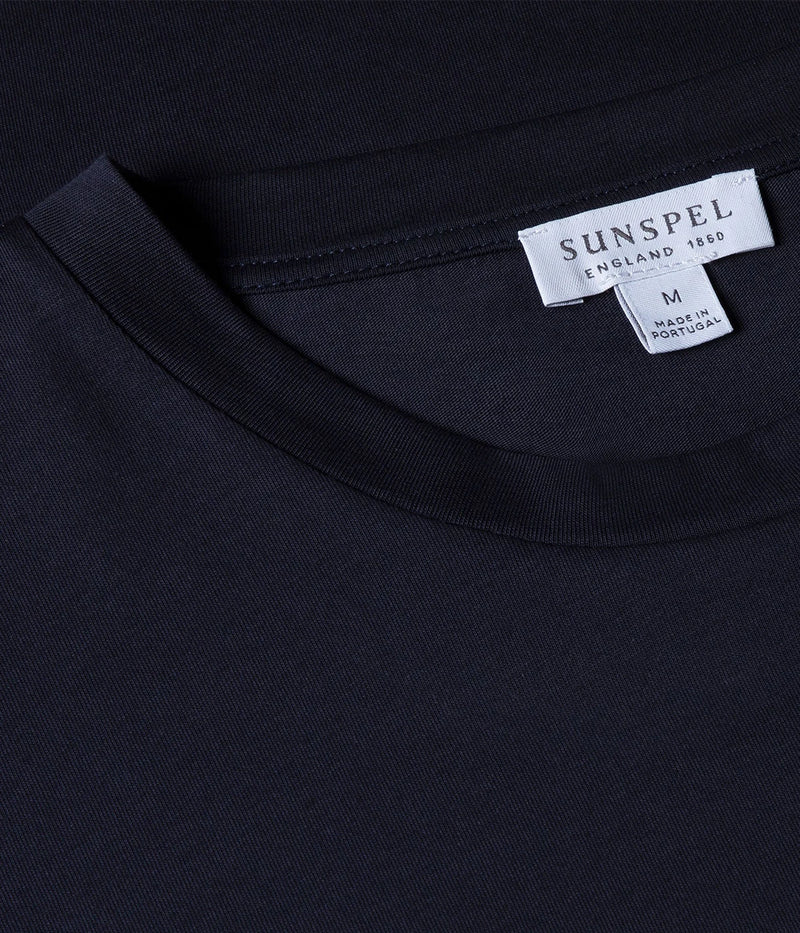 Close-up of the Sunspel Riviera T-Shirt fabric, highlighting the luxurious midweight cotton. The smooth texture and slight extra weight make it durable and perfect for transitioning between seasons.