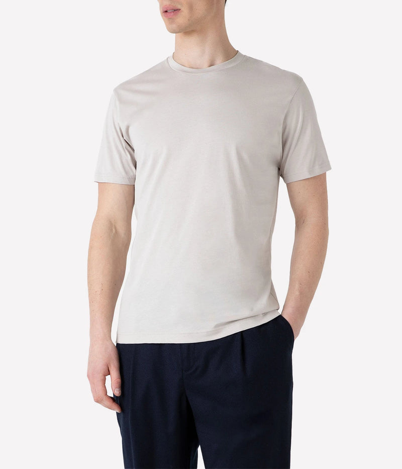 Front view of the Sunspel Riviera T-Shirt, originally designed for Daniel Craig in Casino Royale. Crafted from luxurious midweight cotton, the T-shirt features a classic crew neck and tailored fit, offering a smooth and durable feel perfect for transitional seasons.