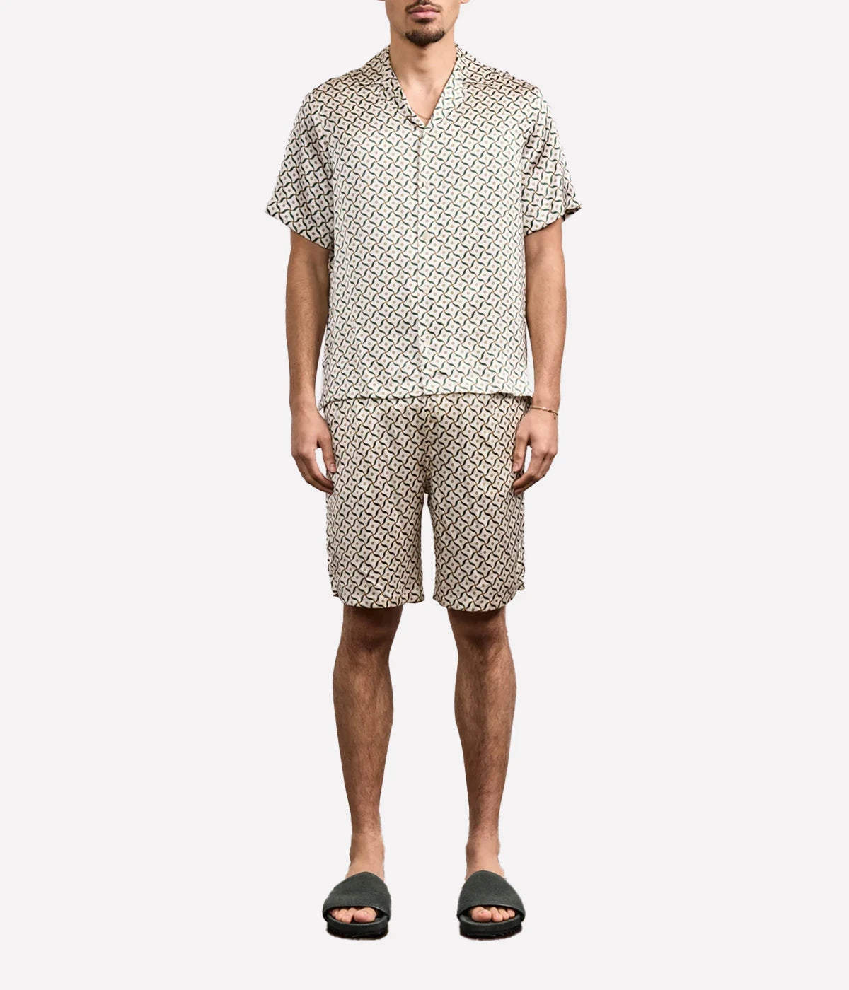 Men’s silk camp collar shirt by Frescobol Carioca with relaxed fit and all-over bespoke Lotus print, crafted from lightweight 100% silk.