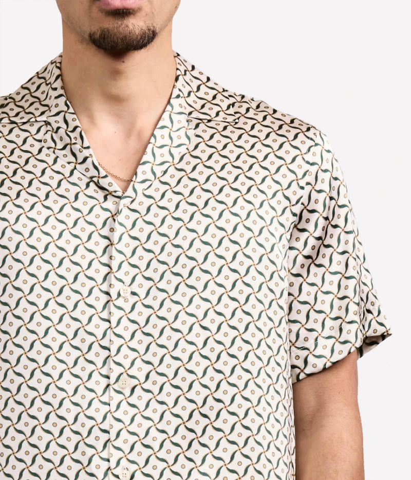 Men’s silk camp collar shirt by Frescobol Carioca with relaxed fit and all-over bespoke Lotus print, crafted from lightweight 100% silk.