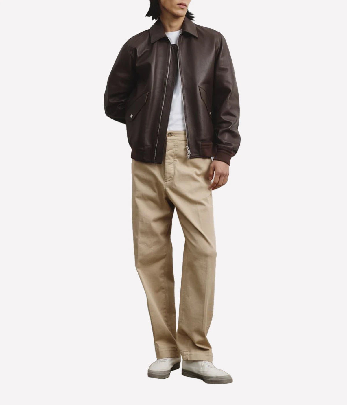 Two-tone nappa leather flight jacket with ribbed trims, flap pockets, and a two-way zipper, made in Italy.