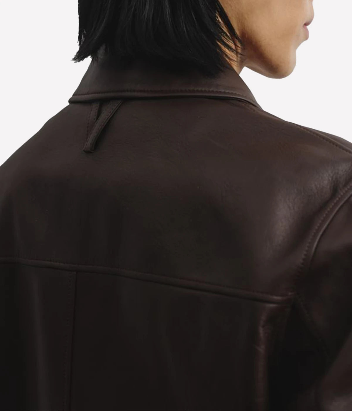 Two-tone nappa leather flight jacket with ribbed trims, flap pockets, and a two-way zipper, made in Italy.