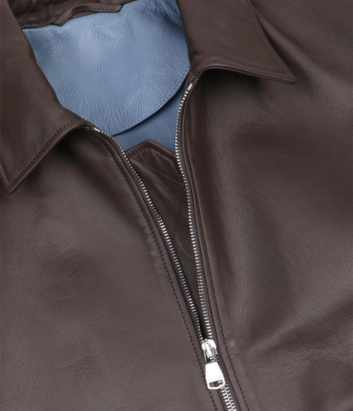 Two-tone nappa leather flight jacket with ribbed trims, flap pockets, and a two-way zipper, made in Italy.