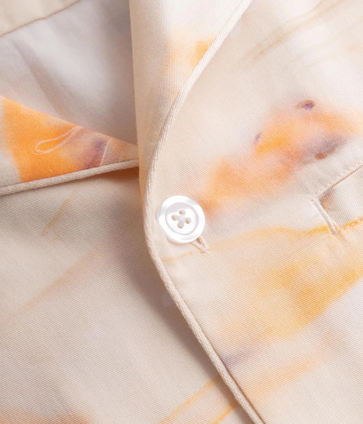 Multicoloured graphic-patterned short-sleeved vacation shirt with an open collar and relaxed fit, crafted from breathable Tencel material. Made in Portugal