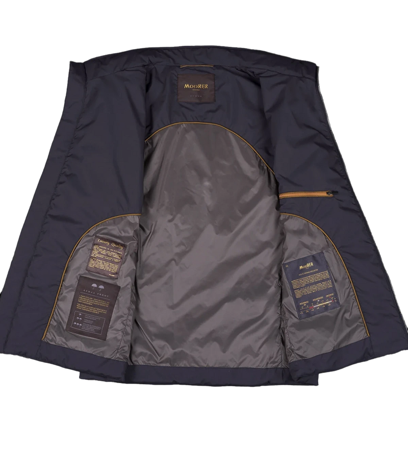 Senio Vest in Navy by MooRER, featuring water-repellent lightweight fabric, synthetic feather-effect padding, double-zip front closure, and zippered pockets. Made in Italy.