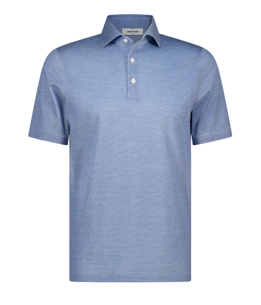 A timeless classic short sleeve polo in a light blue, featuring a light weight cotton material, three button detail and collar. Sporty Polo, comfortable, made in Italy, throw on and go. 
