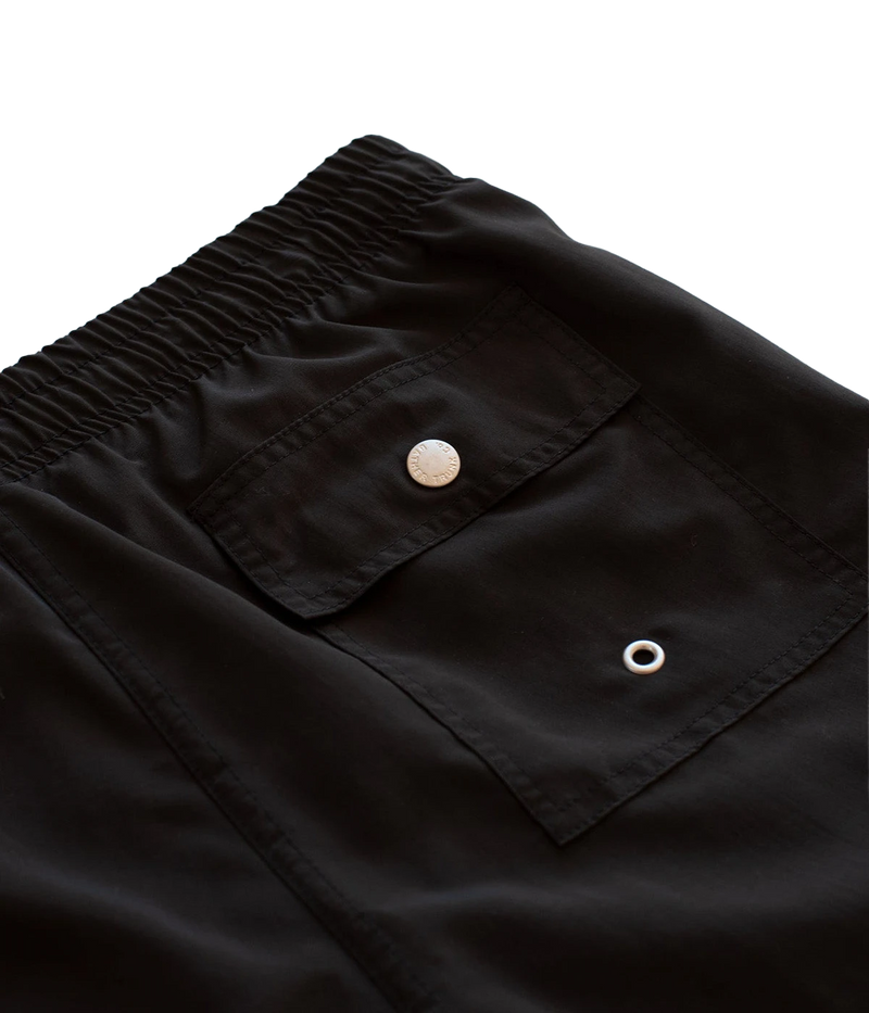 Close-up of Bather swim trunks’ fabric, showcasing the smooth, quick-dry 100% recycled polyester material. The ultra-fine mesh lining offers a soft, barely-there feel with four-way stretch for optimal mobility.