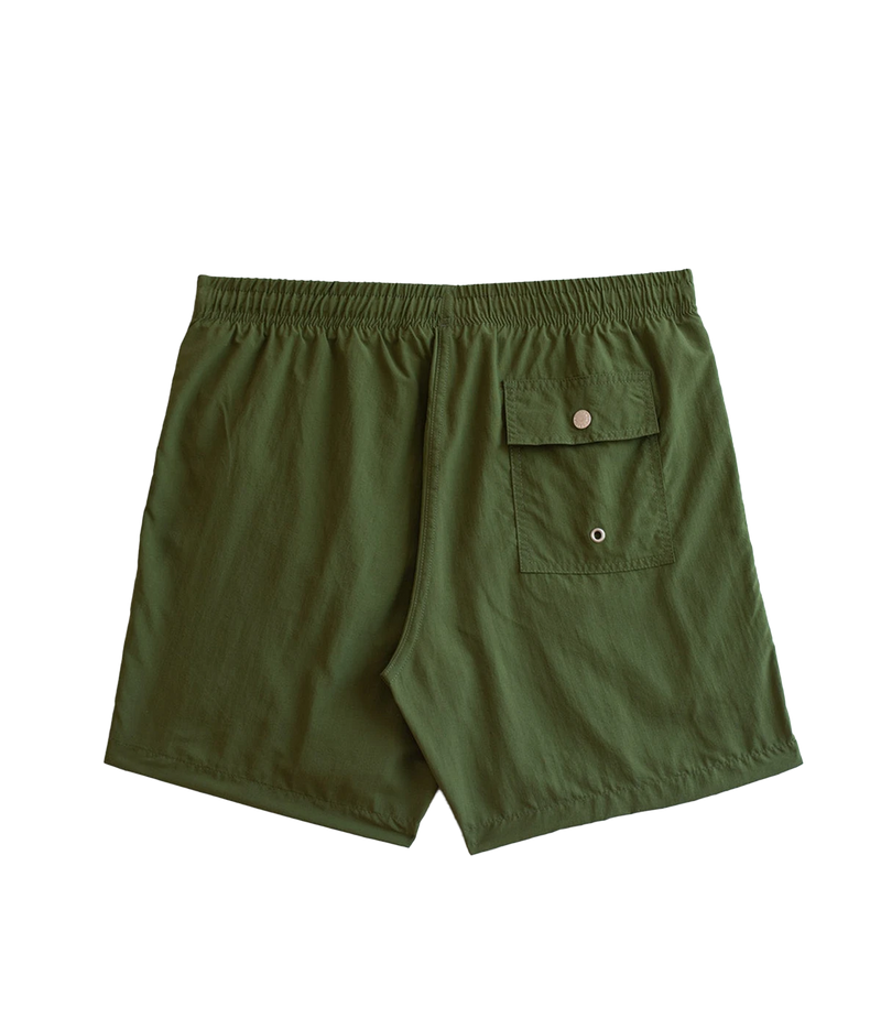 Back view of Bather solid swim trunks, showing the snap-closure back pocket and clean, tailored design. The ultra-fine mesh liner provides quick-dry functionality and four-way stretch for enhanced comfort.