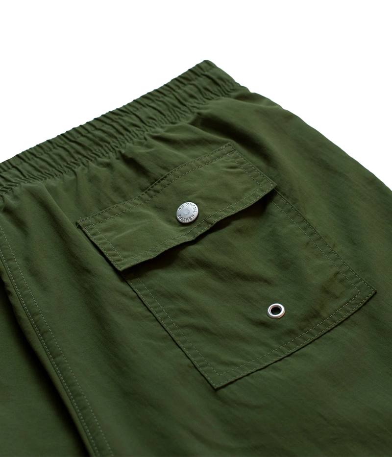 Close-up of Bather swim trunks’ fabric, showcasing the smooth, quick-dry 100% recycled polyester material. The ultra-fine mesh lining offers a soft, barely-there feel with four-way stretch for optimal mobility.