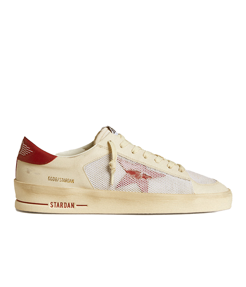 Golden Goose Stardan Sneaker in White and Red, featuring a suede and leather upper with red leather toe and star details. The sneakers have a leather heel, rubber sole for durability, and a breathable lining for comfort, offering a bold, stylish look.