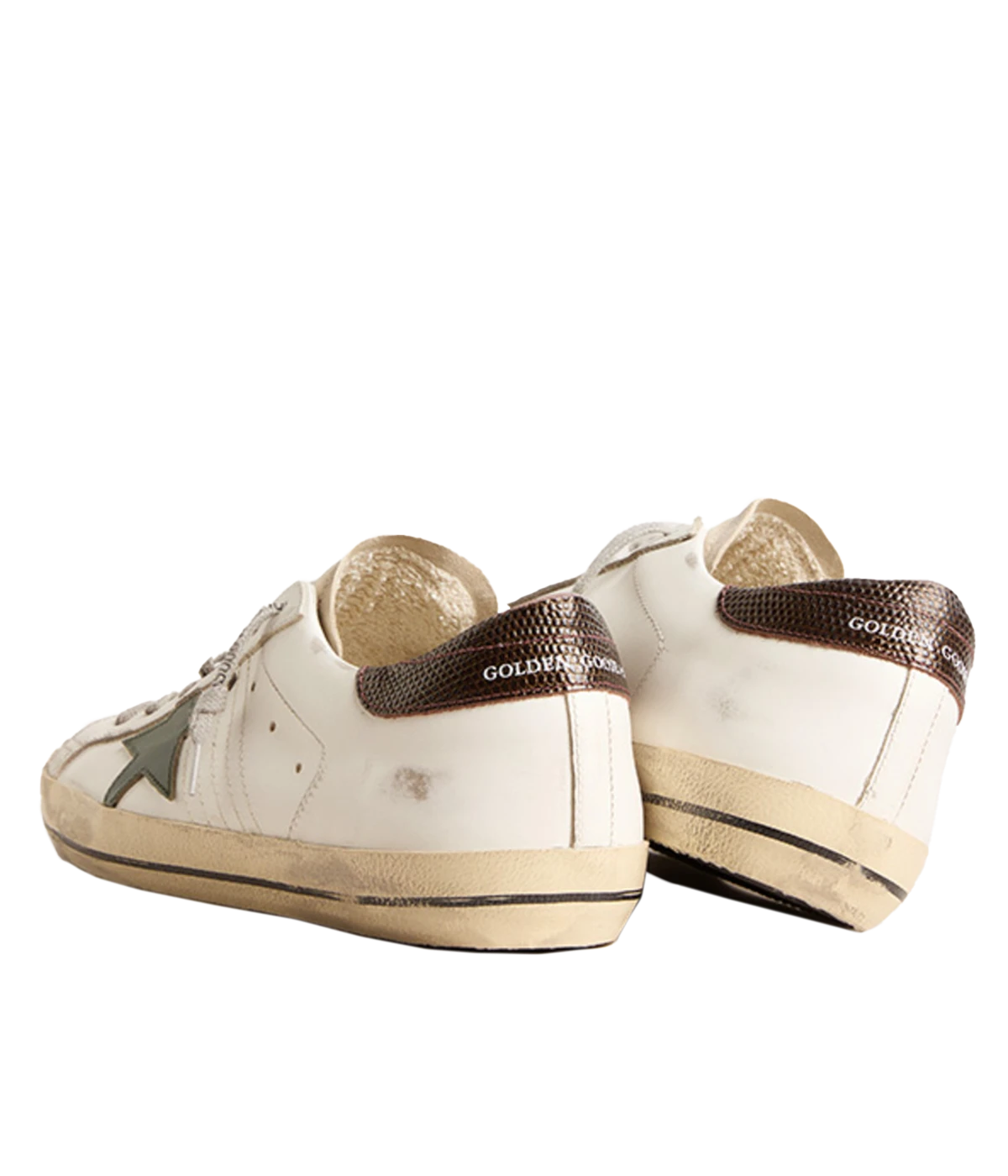A pair of Golden Goose Super Star Sneakers in white, seed pearl, green, and brown, featuring the brand's signature distressed finish for a relaxed, worn-in look. The sneakers include a signature star patch on the sides and a contrasting green and brown heel counter. Designed with a front lace-up fastening, round toe, and flat rubber sole, these sneakers are perfect for everyday wear, offering a mix of style, comfort, and signature Golden Goose flair.