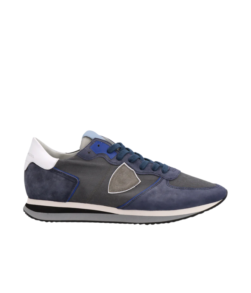 Side view of Philippe Model TRPX sneakers, showcasing their retro-inspired silhouette and modern treatments. The mix of premium materials and bold design elements make them ideal for stylish urban looks.