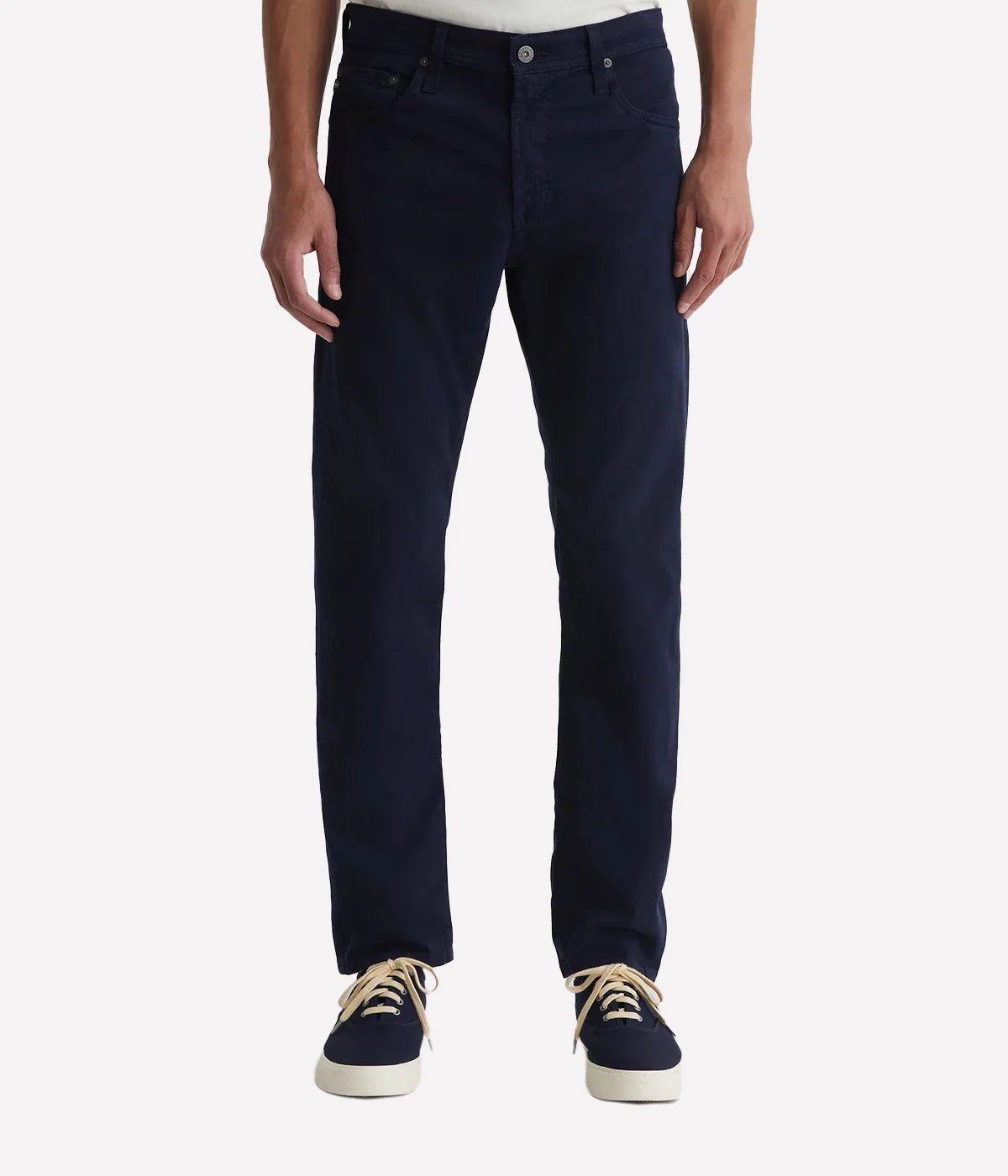 Men’s pants in a brushed finish sueded stretch sateen fabric, with a smooth and refined texture.
