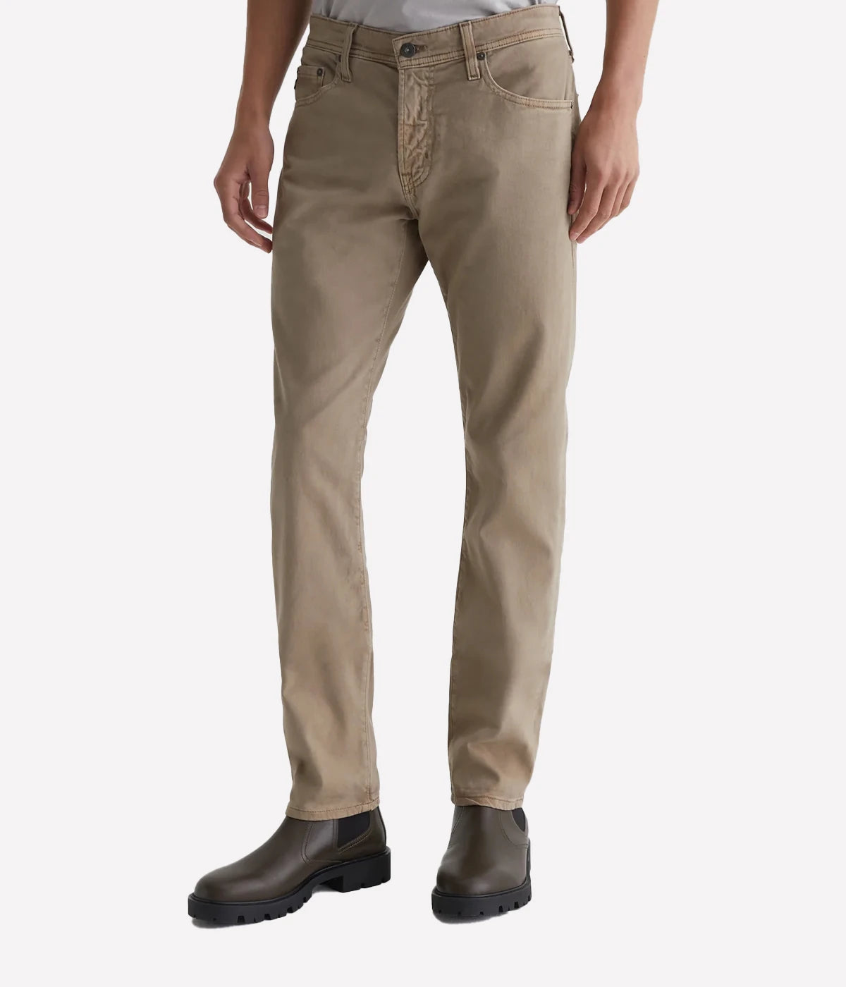 Tellis modern slim-fit jeans for men in a sulfur-dyed beige wash. Featuring faded details and worn pocket edges that replicate 7 years of wear. Crafted from a stretch-enhanced blend for comfort and style.