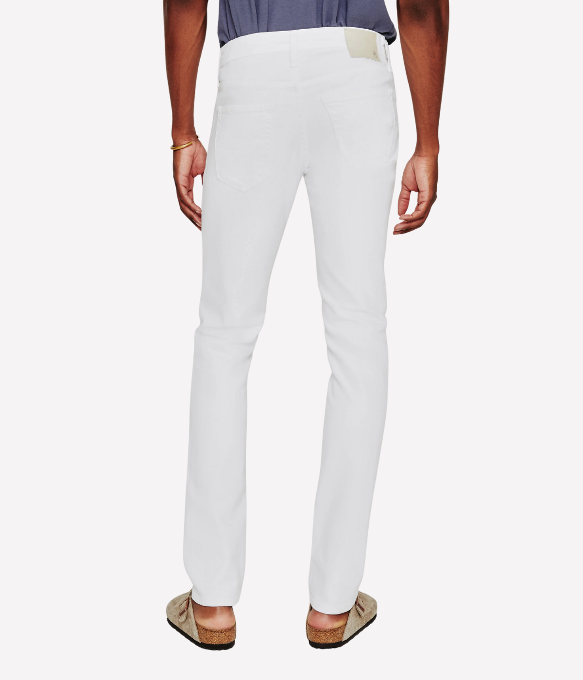 Men’s slim white jeans by AG Tellis, tapered leg in lightweight stretch Dover denim, perfect for smart casual looks.