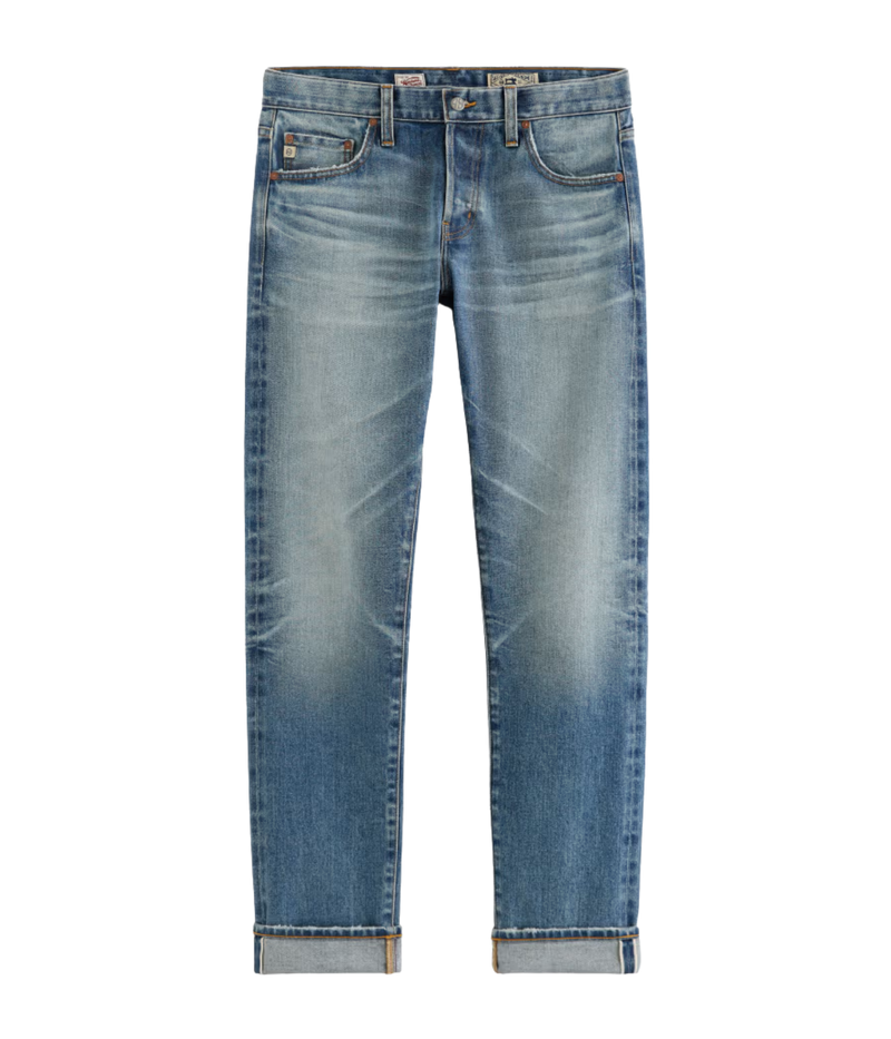 Men’s AG Tellis jeans in 14-year faded blue AG-ed™ wash, crafted from Japanese stretch selvage denim with a modern slim fit and tapered leg.