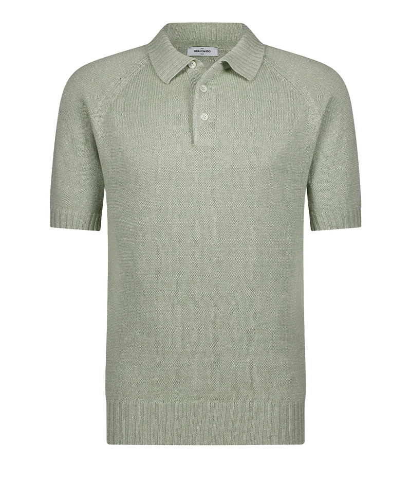 A timeless classic short sleeve polo in a mint, knitted material, made in Italy, featuring three button and collar detailing. Throw on and go, dressy polo, everyday staple.  