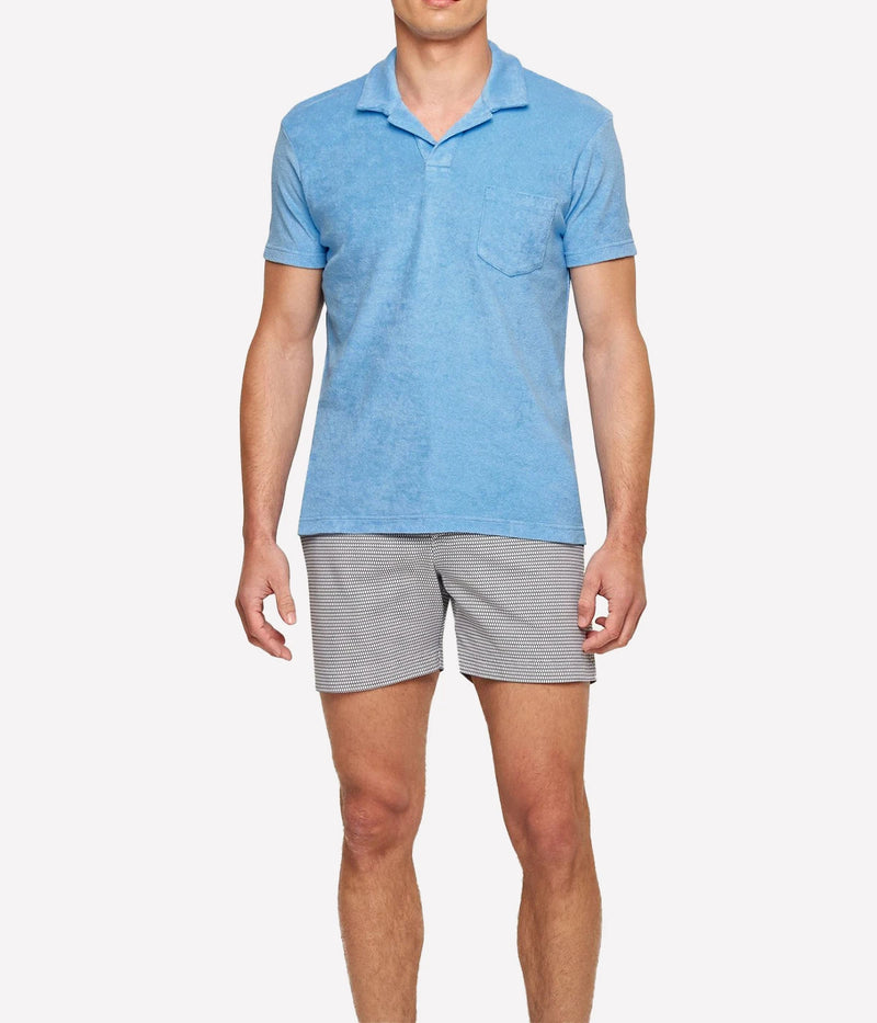 Front view of the Terry Towelling Polo, highlighting its sharp tailored fit, short sleeves, and open placket design.