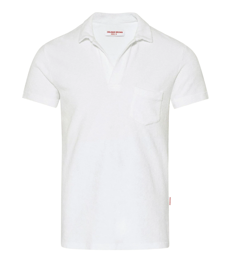 White terry towelling polo by Orlebar Brown, featuring a soft and breezy fabric with a stylish open placket. The tailored fit ensures comfort without being too snug, making it the perfect casual yet polished piece. Pair it with Orlebar Brown swim shorts for a complete holiday look. Made from 100% terry towelling cotton.